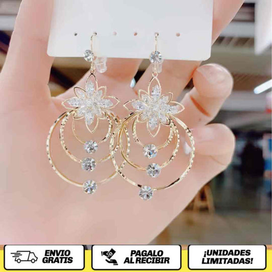 LUMYNIA™ — El Arete Que Habla Por Ti - Brilla. Encanta. Impacta.