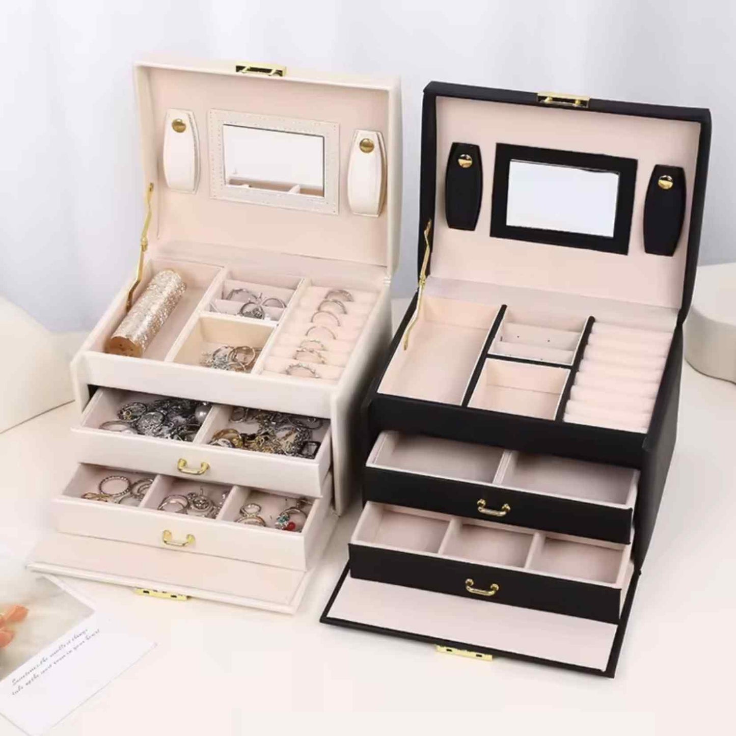GlamVault™ Jewelry Box El cofre de 3 niveles que mantiene tus joyas seguras, ordenadas y siempre listas para brillar.
